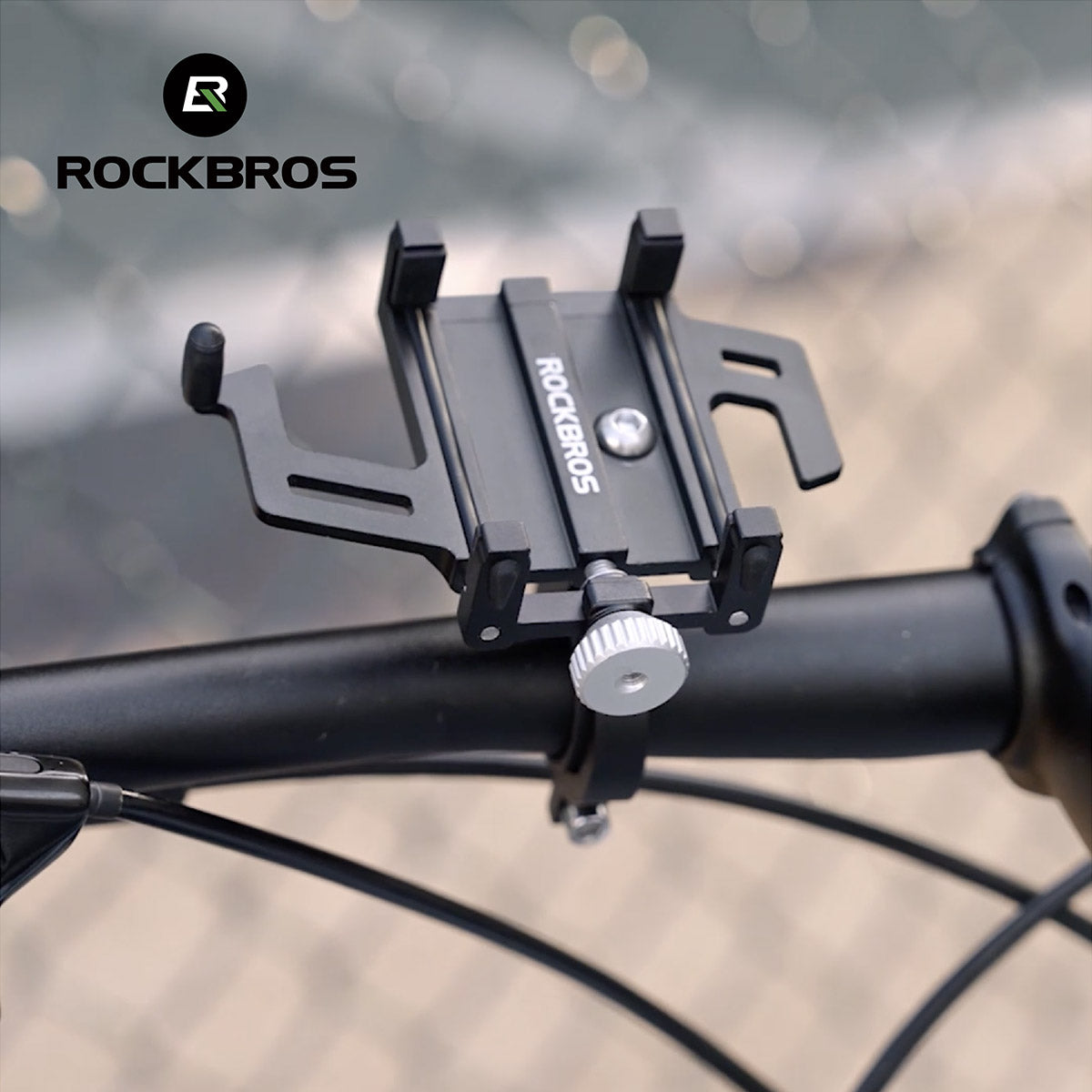 Universelle Aluminium-Handyhalterung für Rennrad/MTB, breiteneinstellbar per Rändelschraube, sicher am Lenker montiert.